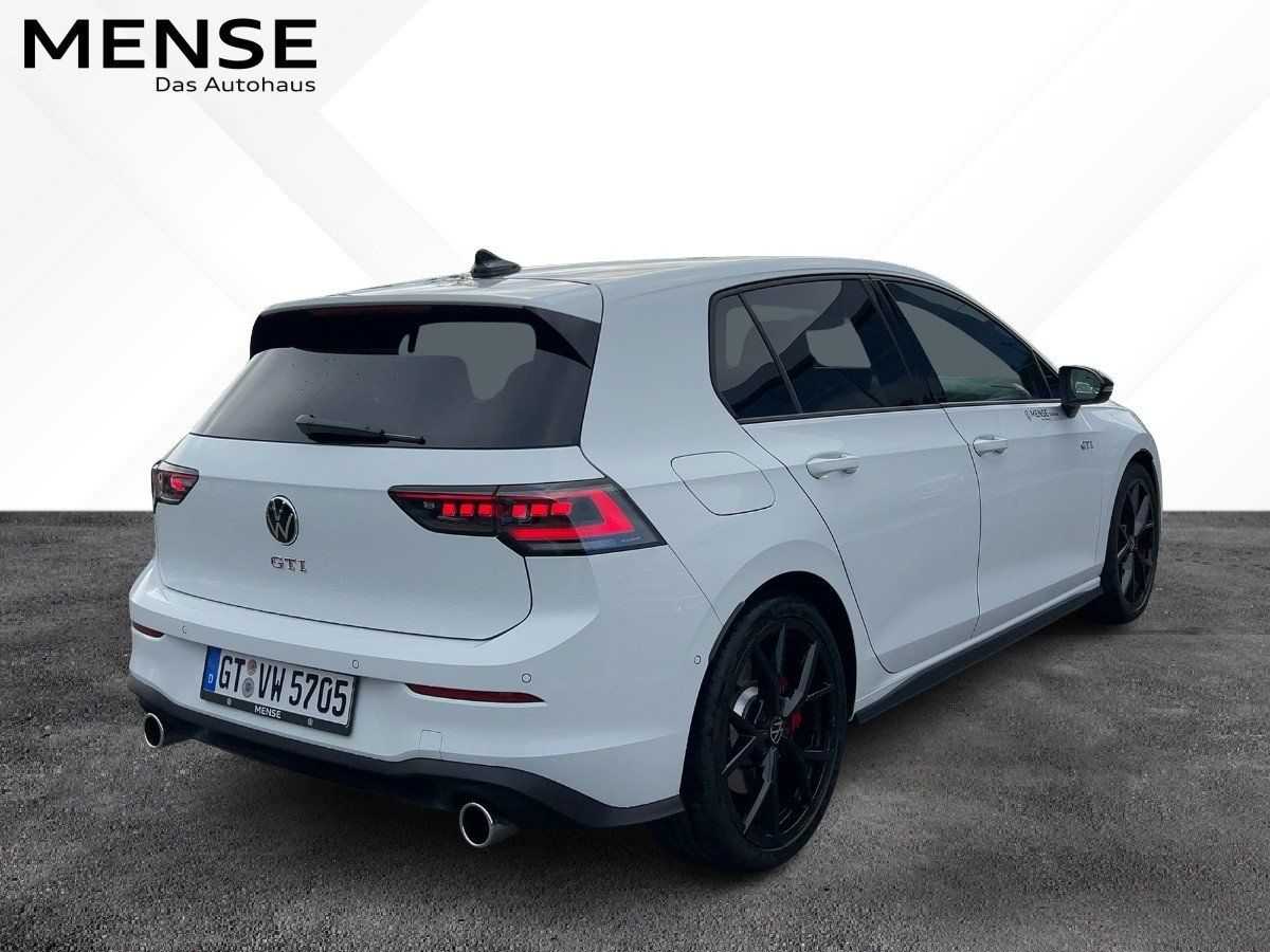 Fahrzeugabbildung Volkswagen Golf GTI 2.0 l TSI OPF DSG Pano Nav HUD 360 Blac - mit KI generiert/bearbeitet