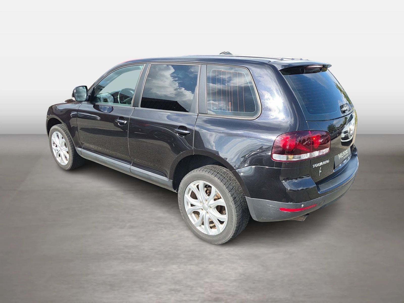 Fahrzeug autohaus mense Fahrzeugabbildung Volkswagen Touareg 2.5l TDI 128kW 6-Gang-Automatik AHK|Face - mit KI generiert/bearbeitet